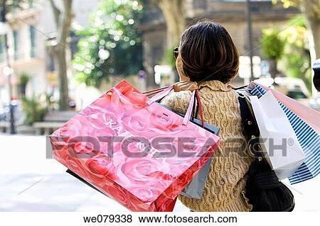 back view, carry, brunette, bag, addiction View Large Photo Image Stock Photo - back view, carry, brunette, bag, addiction. Fotosearch