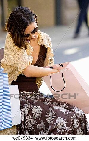 bag, brunette, calling, cell phone View Large Photo Image Picture - bag, brunette, calling, cell phone. Fotosearch