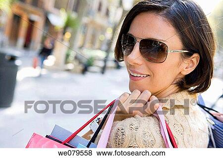bag, carrying, carry, brunette, addiction View Large Photo Image Stock Photo - bag, carrying, carry, brunette, addiction. Fotosearch