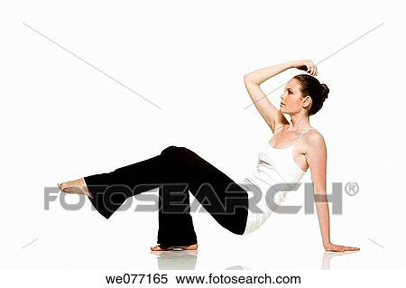 Stock Photography - balance, barefoot, brunette, clipping path. Fotosearch