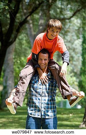 balance, boy, black hair, amusement View Large Photo Image Stock Photo - balance, boy, black hair, amusement. Fotosearch