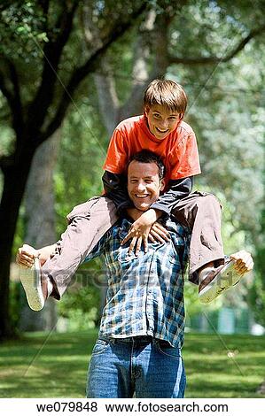 balance, boy, black hair, amusement View Large Photo Image Stock Photo - balance, boy, black hair, amusement. Fotosearch