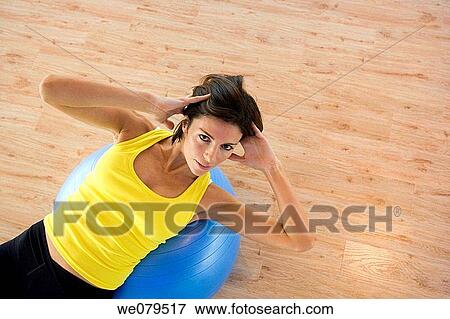 Stock Photo - ball, brunette, contemporary. Fotosearch