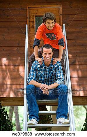 bannister, black hair, boy, cabin View Large Photo Image Stock Photo - bannister, black hair, boy, cabin. Fotosearch