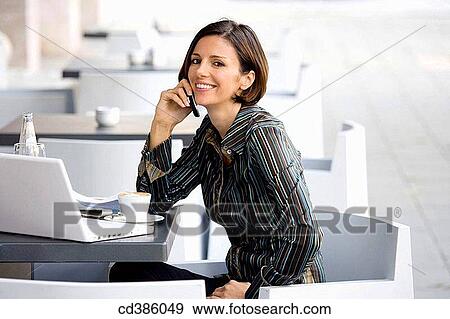 Stock Photo - bar, business, businesspeople, businesswoman, cafe. Fotosearch
