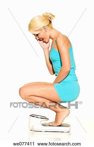 barefoot, Bathroom scale, blond, clipping path View Large Photo Image Stock Image - barefoot, Bathroom scale, blond, clipping path. Fotosearch