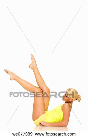 Stock Photo - barefoot, beauty, blond, clipping path. Fotosearch