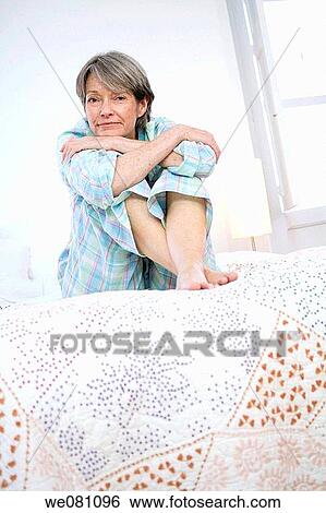 barefoot, bed, at-home View Large Photo Image Stock Photograph - barefoot, bed, at-home. Fotosearch