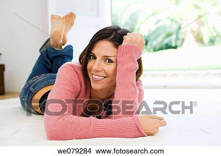 barefoot, calm, brunette, at-home View Large Photo Image Picture - barefoot, calm, brunette, at-home. Fotosearch