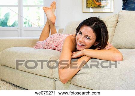 barefoot, calm, brunette, at-home View Large Photo Image Stock Image - barefoot, calm, brunette, at-home. Fotosearch