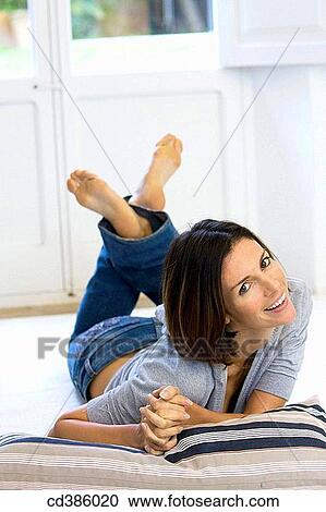 barefoot, carefree, calm, brunette, at-home View Large Photo Image Stock Image - barefoot, carefree, calm, brunette, at-home. Fotosearch