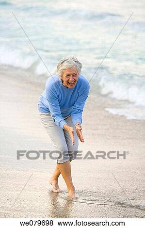 barefoot, Clap hands, beach, amusement View Large Photo Image Stock Photo - barefoot, Clap hands, beach, amusement. Fotosearch