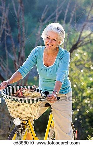 Stock Image - basket, bicycle, break, break-time, calm. Fotosearch