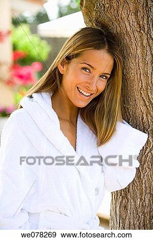 Stock Photo - bathrobe, brown hair, chestnut hair. Fotosearch