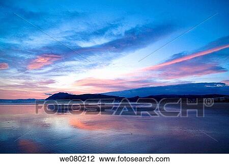 Beach at sunrise, Laredo. Cantabria, Spain View Large Photo Image Stock Image - Beach at sunrise, Laredo. Cantabria, Spain. Fotosearch
