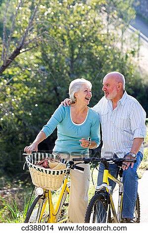 Picture - beard, bicycle, bond, bonding. Fotosearch
