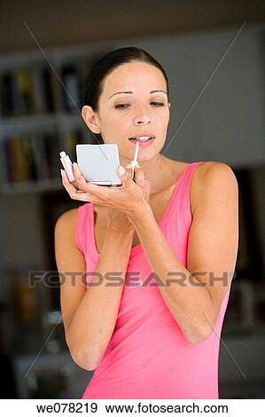 Stock Photo - beauty, brunette, Beauty Care, apply. Fotosearch