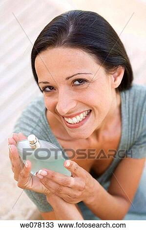 beauty, brunette, bottle, Body care, aroma View Large Photo Image Stock Image - beauty, brunette, bottle, Body care, aroma. Fotosearch