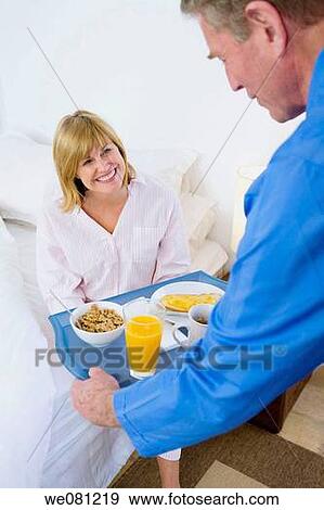 bed, carry, breakfast, bowl, at-home View Large Photo Image Stock Photo - bed, carry, breakfast, bowl, at-home. Fotosearch