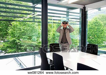 binocular, black hair, board-room, business View Large Photo Image Picture - binocular, black hair, board-room, business. Fotosearch