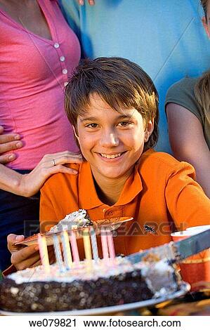 Birthday cake, black hair, boy, candle View Large Photo Image Stock Image - Birthday cake, black hair, boy, candle. Fotosearch