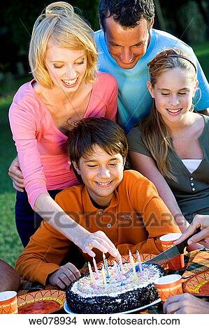 Birthday cake, boy, brother, candle View Large Photo Image Picture - Birthday cake, boy, brother, candle. Fotosearch