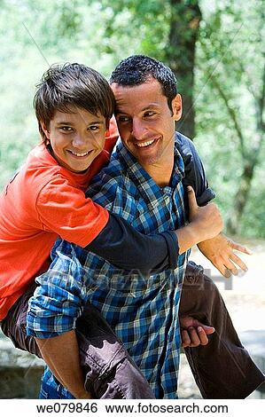 black hair, boy, bonding, bond, amusement View Large Photo Image Stock Photograph - black hair, boy, bonding, bond, amusement. Fotosearch