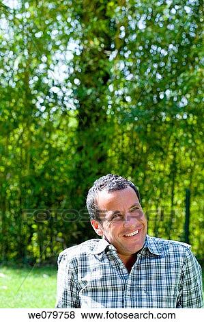 Stock Photo - black hair, calm, absorbed. Fotosearch