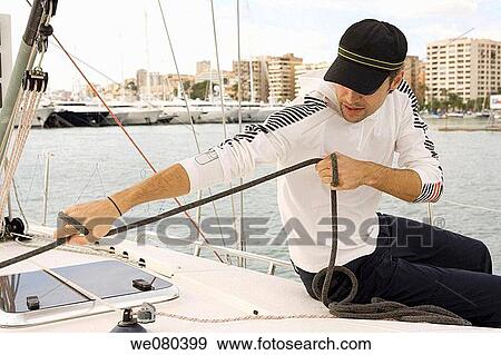 Stock Photo - black hair, cap, ability. Fotosearch