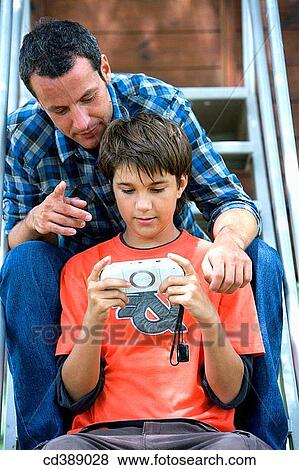 black hair, child, boy, addiction View Large Photo Image Stock Photo - black hair, child, boy, addiction. Fotosearch