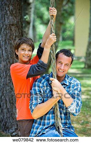 black hair, child, boy, amusement View Large Photo Image Stock Image - black hair, child, boy, amusement. Fotosearch