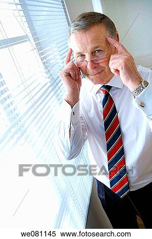 blind, businessman, business, blue eyes, Arm raised View Large Photo Image Stock Photography - blind, businessman, business, blue eyes, Arm raised. Fotosearch