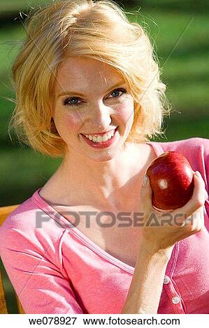 blond, contemporary, apple View Large Photo Image Stock Photo - blond, contemporary, apple. Fotosearch