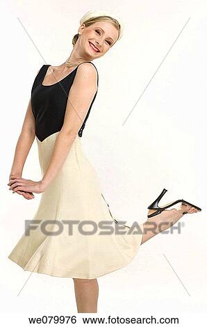 Blond woman posing in the Studio View Large Photo Image Stock Photograph - Blond woman posing in the Studio. Fotosearch
