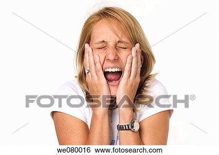 Stock Photograph - Blond woman screaming. Fotosearch