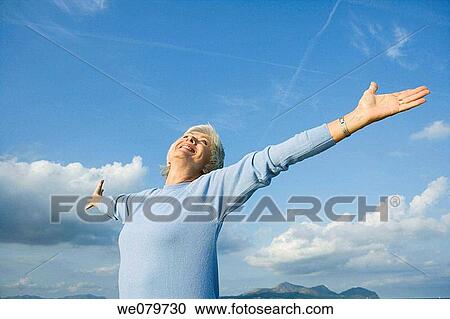 Stock Image - blue, contemporary, Arms open. Fotosearch