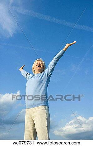 Stock Image - blue, contemporary, Arms open. Fotosearch