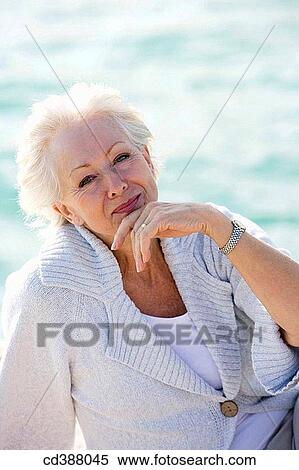 Stock Photography - blue eyes, calm, contemporary. Fotosearch