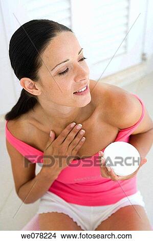 Body care, brunette, apply View Large Photo Image Picture - Body care, brunette, apply. Fotosearch