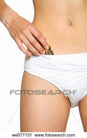Body piercing, bottle, carnality View Large Photo Image Stock Image - Body piercing, bottle, carnality. Fotosearch