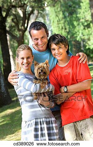 Stock Photograph - boy, child, brother, animal. Fotosearch