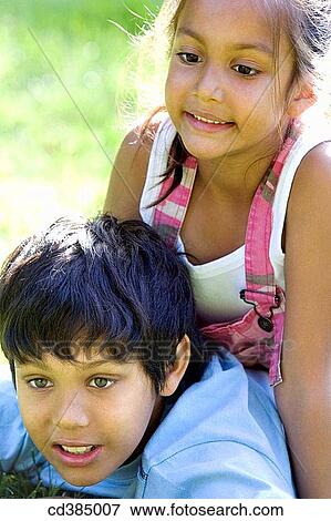 Stock Photo - boy, childhood, child, brother, Asian. Fotosearch