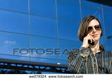 brunette, business, businesspeople, businesswoman, calling View Large Photo Image Picture - brunette, business, businesspeople, businesswoman, calling. Fotosearch