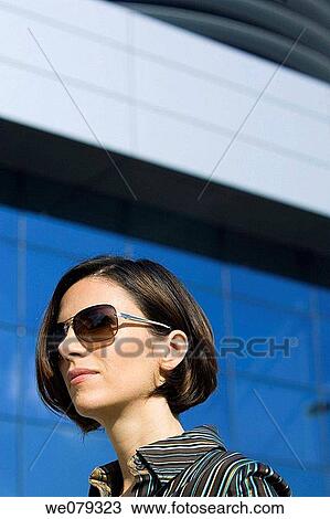 Stock Image - brunette, businesswoman, businesspeople, business, accessory. Fotosearch