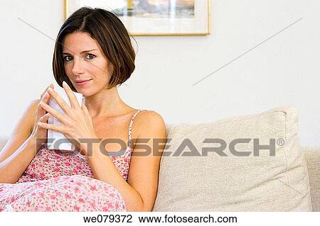 brunette, calm, at-home View Large Photo Image Stock Image - brunette, calm, at-home. Fotosearch
