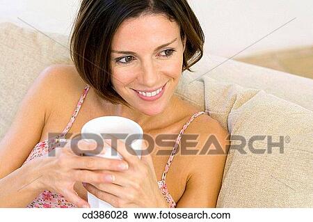 brunette, calm, at-home View Large Photo Image Stock Photo - brunette, calm, at-home. Fotosearch