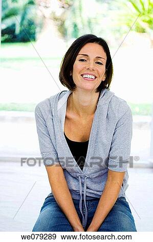 brunette, calm, at-home View Large Photo Image Stock Photo - brunette, calm, at-home. Fotosearch