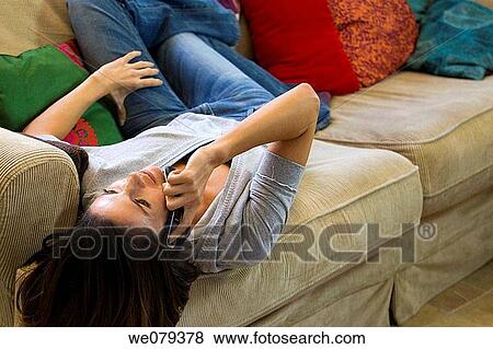 brunette, calm, calling, at-home View Large Photo Image Stock Photo - brunette, calm, calling, at-home. Fotosearch