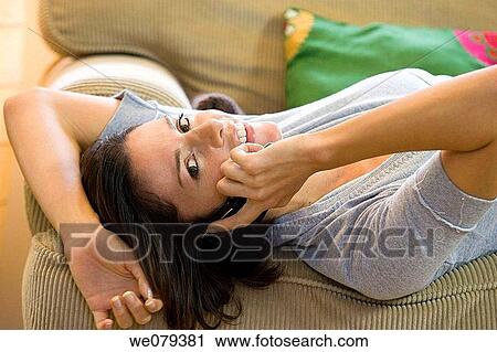 brunette, cell phone, calling, at-home View Large Photo Image Stock Image - brunette, cell phone, calling, at-home. Fotosearch