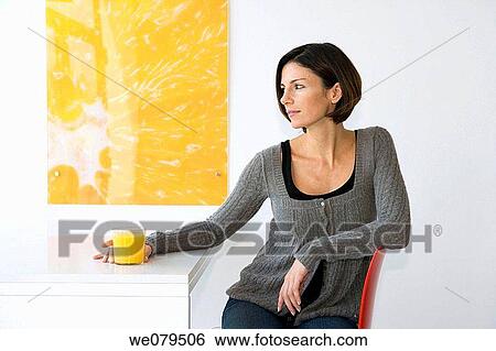 brunette, chair, absorbed View Large Photo Image Stock Photograph - brunette, chair, absorbed. Fotosearch